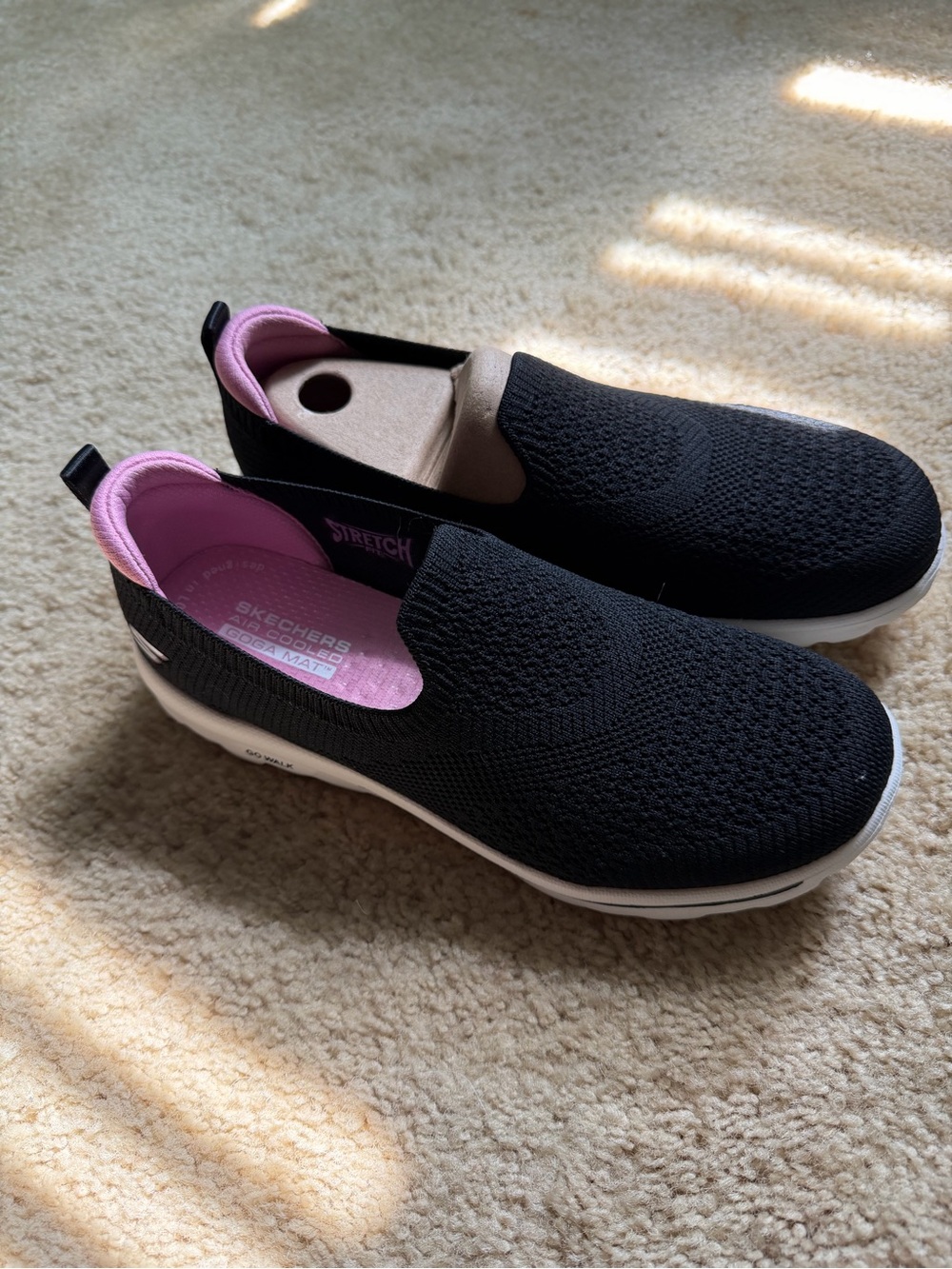 Skechers Women’s Black Knit Slip-On Sneakers with Pink Interior